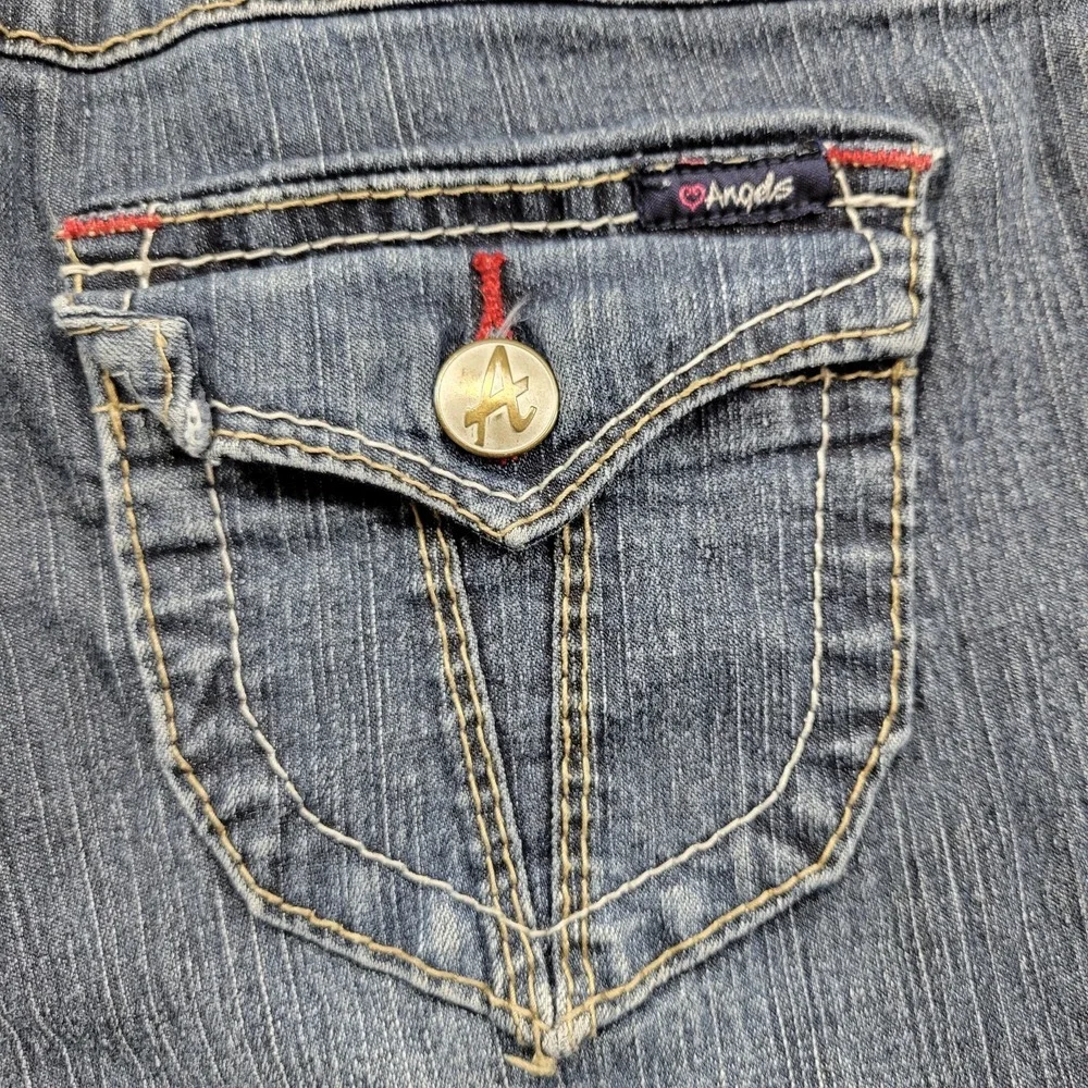 Angels well worn blue jeans size 7 w/ flap pockets